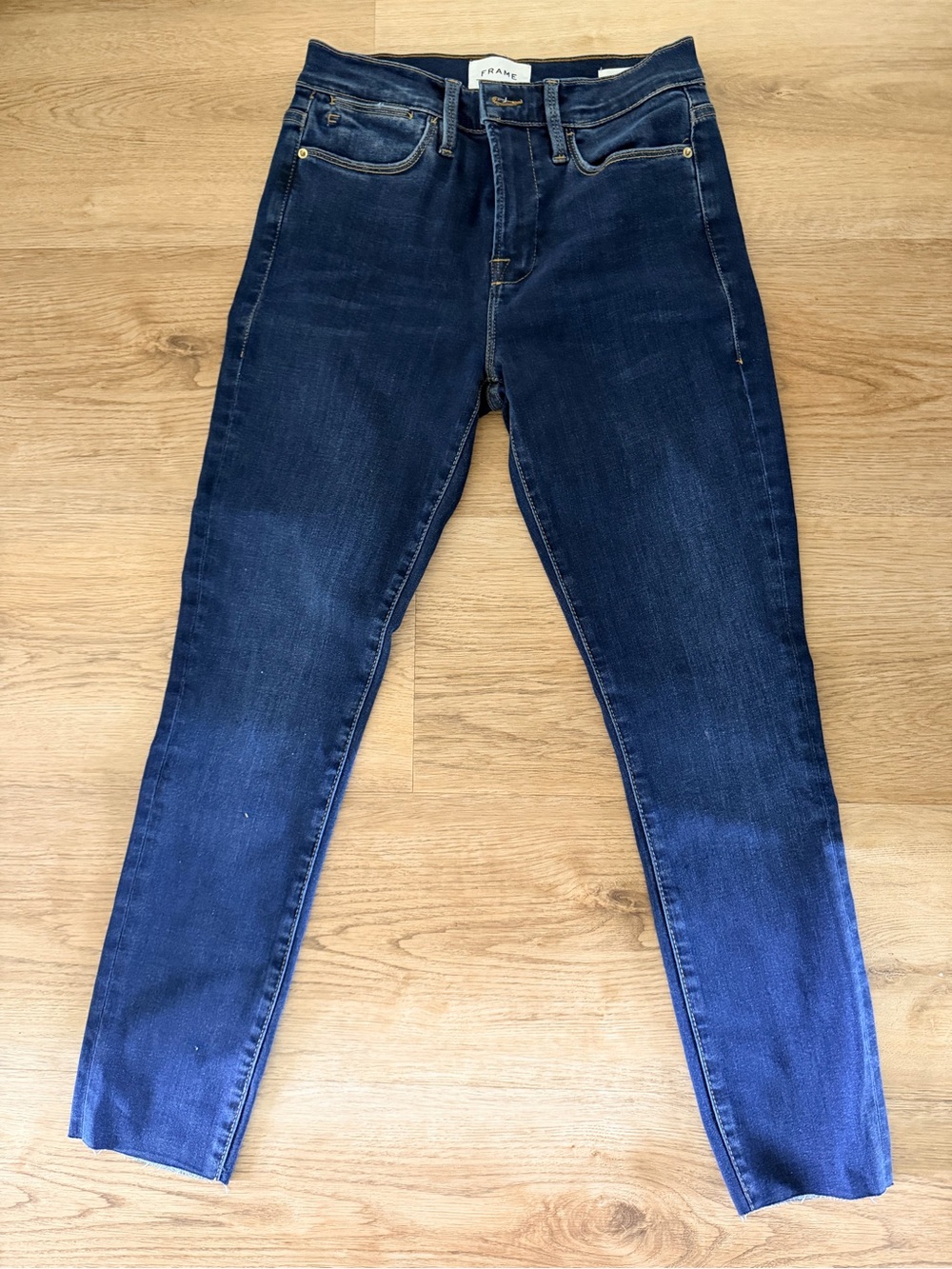 Frame Denim High-Rise Skinny Jeans in Dark Blue